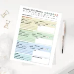 Color-coded daily priority worksheet for tracking task action steps and energy levels with high visual clarity