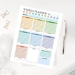 A minimalist weekly planner template with color-coded daily blocks, goal setting sections, and a weekly reflection area